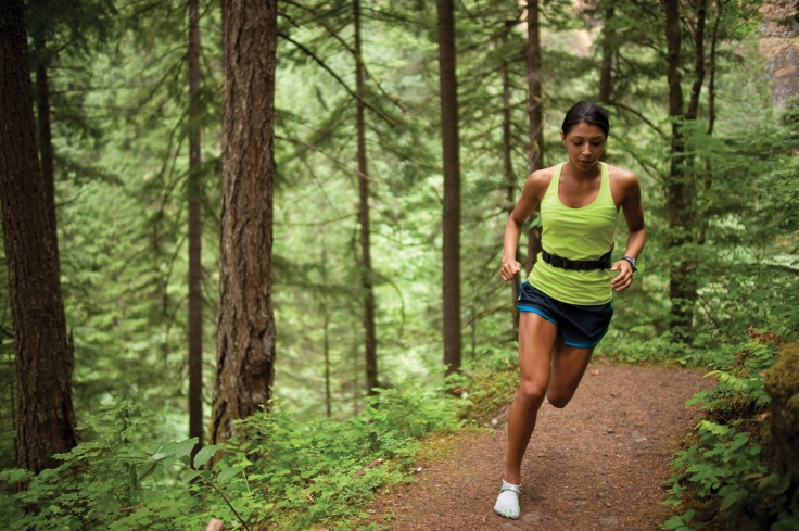 Woman running the Elowah Falls Trail